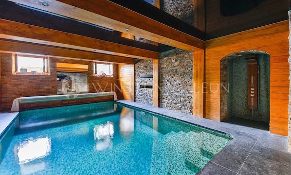 Indoor pool, open 4:30 PM to 8:30 PM, pool loungers