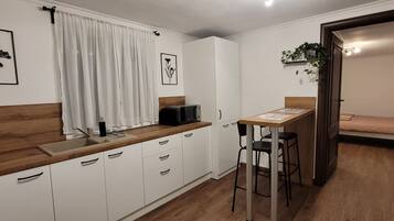 Fridge, microwave, coffee/tea maker, electric kettle