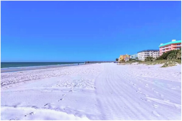 On the beach, sun-loungers, beach towels