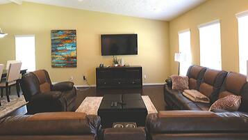 Signature House, 4 Bedrooms | Living area | TV