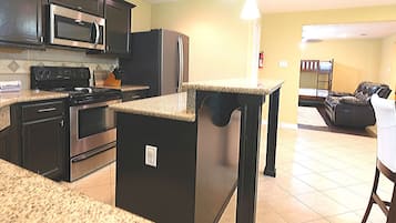 Signature House, 4 Bedrooms | Private kitchen | Fridge, microwave, stovetop, dishwasher