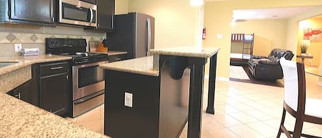 Signature House, 4 Bedrooms | Private kitchen | Fridge, microwave, stovetop, dishwasher