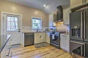 Fridge, microwave, stovetop, dishwasher - Renovated Carrboro House with Deck & Fire Pit! (Carrboro)