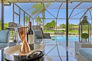 A heated pool - Luxury Heated Pool Oasis on Canal • Dock, Lanai & Close to Beaches (Cape Coral)