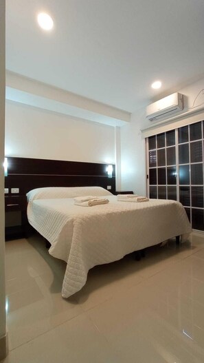 Familjerum för fyra - 2 sovrum | Sängtillbehör av högsta kvalitet, duntäcken och Select Comfort-madrasser