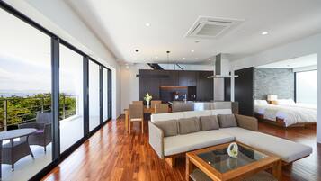 Villa Elite | Área de sala de estar | Televisión LCD de 50 pulgadas con canales digitales y televisión