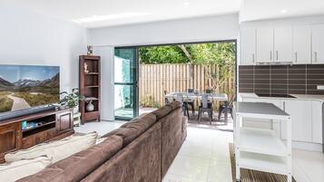 Family Apartment | Living area | Flat-screen TV