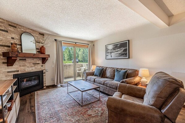 Living Area w/ Fireplace and TV