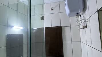 Shower, towels, soap, toilet paper