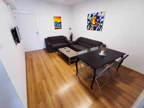 Standard Apartment | Living area | 32-inch LCD TV with satellite channels, TV - Daze Off Central Apartment (Larnaca)