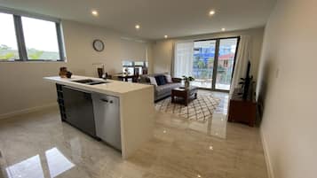 Family Apartment, 2 Bedrooms, Balcony | Living area | 55-inch Smart TV with digital channels, TV