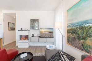 Fernseher, Kamin