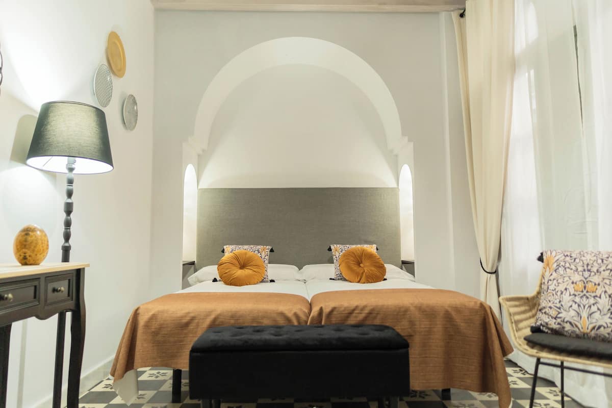 Standard Room | 1 bedroom, down duvets, in-room safe, individually decorated
