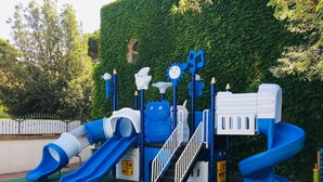 A playground with slides and climbing structures. - Resort in Lido di Spina near Adriatic Coast (Lido di Spina)