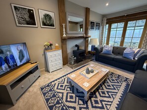 Casa de campo | Zona de estar | Una chimenea