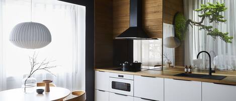 Fridge, microwave, stovetop, coffee/tea maker