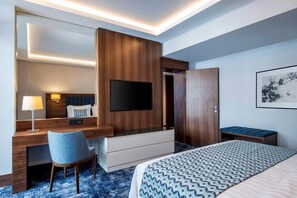 Suite executiva | Minibar i roba de llit 