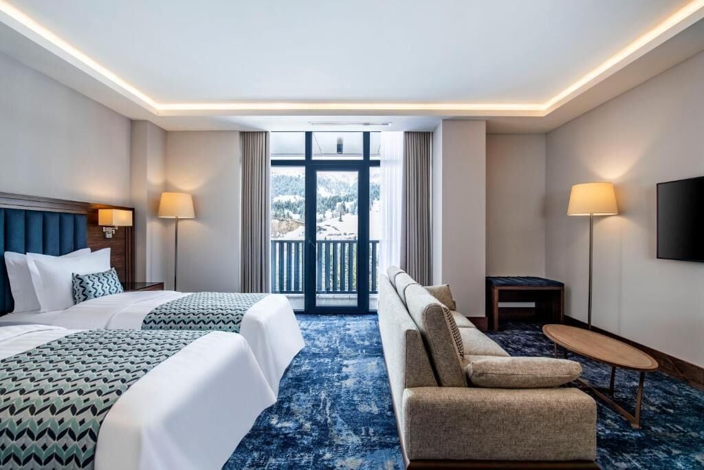 Habitación ejecutiva, 1 habitación | Minibar y ropa de cama 