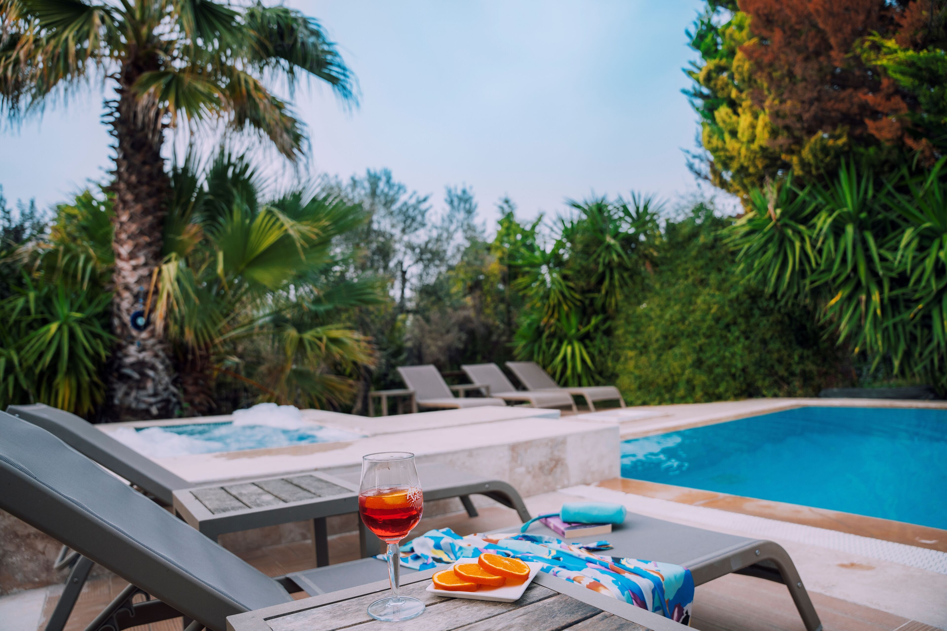 Outdoor pool, pool umbrellas, sun loungers