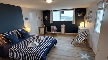 2 habitaciones, tabla de planchar con plancha y cuna de viaje