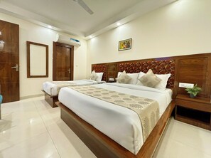 Deluxe Triple Room | Egyptian cotton sheets, premium bedding, Select Comfort beds, desk - Hotel Emblem Suites By Denver, Delhi Airport (New Delhi)