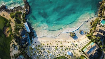 On the beach, white sand, free beach cabanas, sun loungers