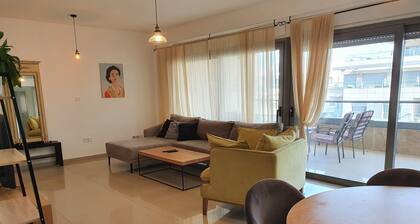 Luxury 2 BR apt with a huge balcony & sea view