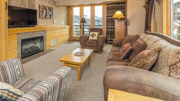 Flat-screen TV, fireplace