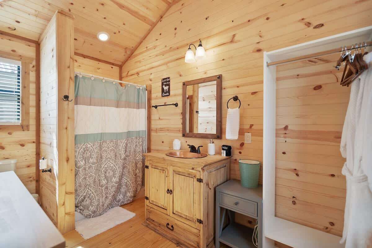 Shower, hair dryer, towels, shampoo