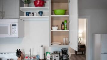 Coffee/tea maker, fridge, microwave, oven