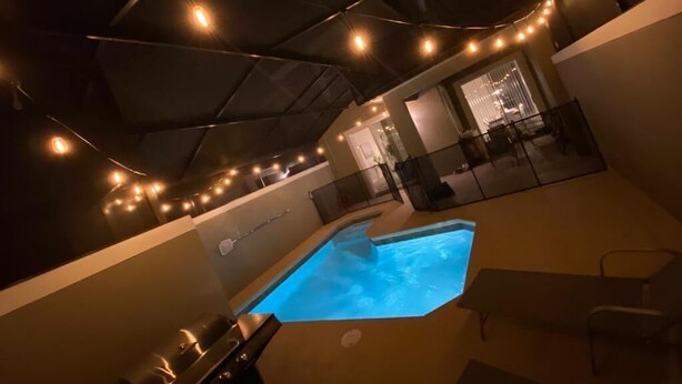 Condo, Multiple Beds (4321 QS - Magical Haven Townhome w/ P) | Pool | A heated pool - 4321 QS - Magical Haven Townhome w/ Pool (Kissimmee)