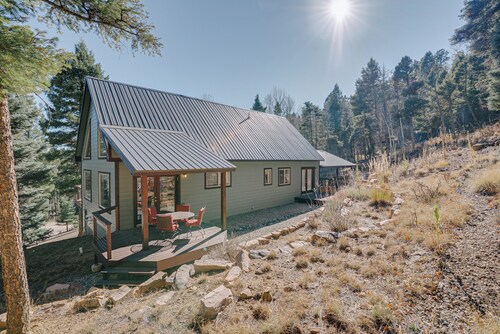Home in the Woods with a Spacious Deck