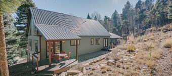 Home in the Woods with a Spacious Deck