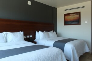 Standard Room, 2 Queen Beds, Sea View | Down comforters, in-room safe, desk, laptop workspace