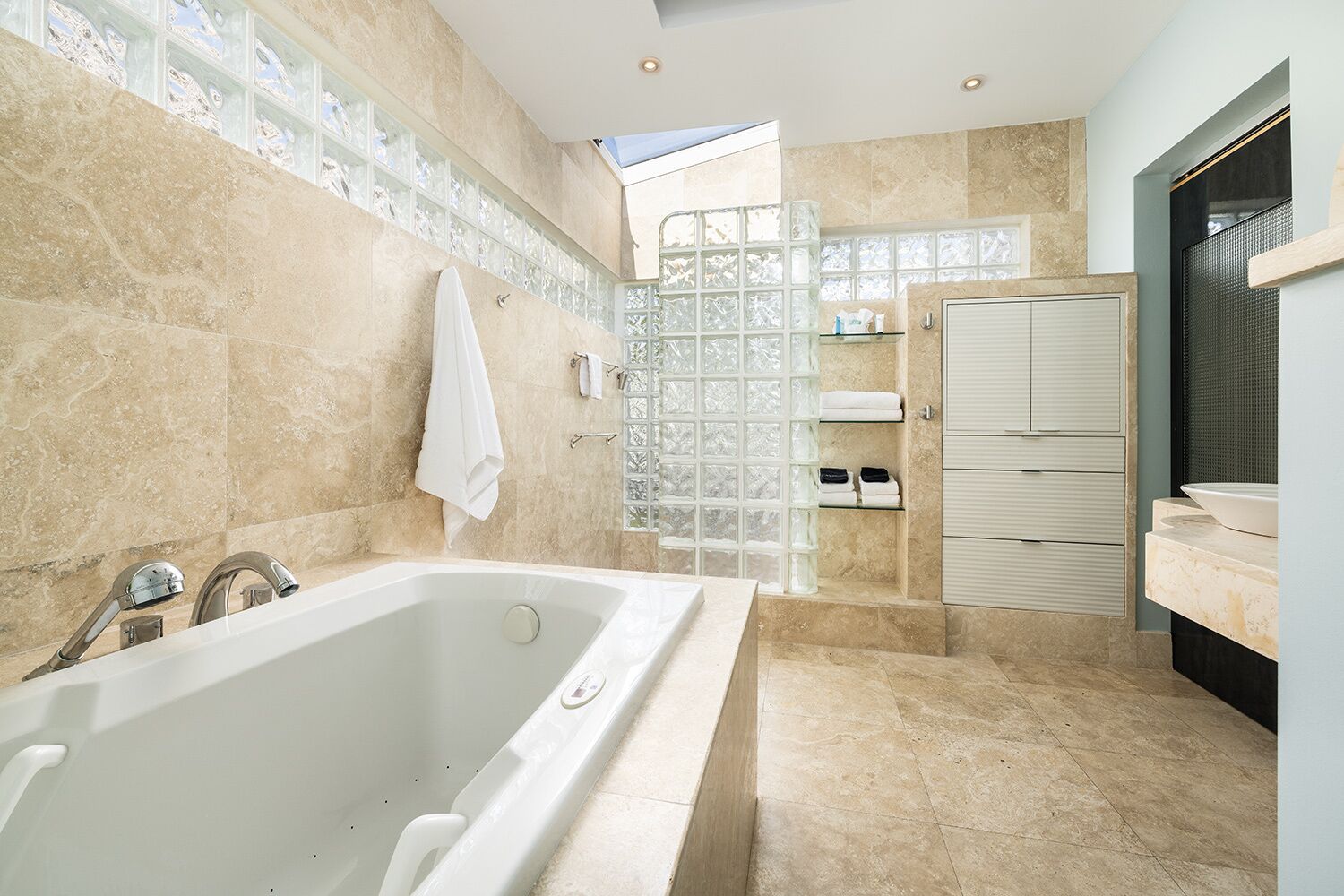 fig suite | bathroom | shower, hair dryer, towels