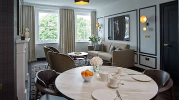 Deluxe Apartment, 2 Bedrooms | Living area | Flat-screen TV