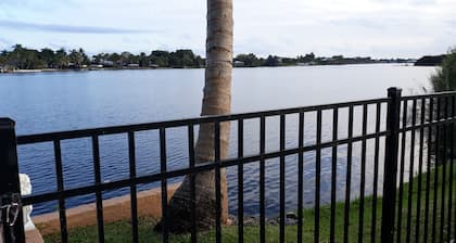 A private waterfront Lake Ida setting located in the middle of 23 acres