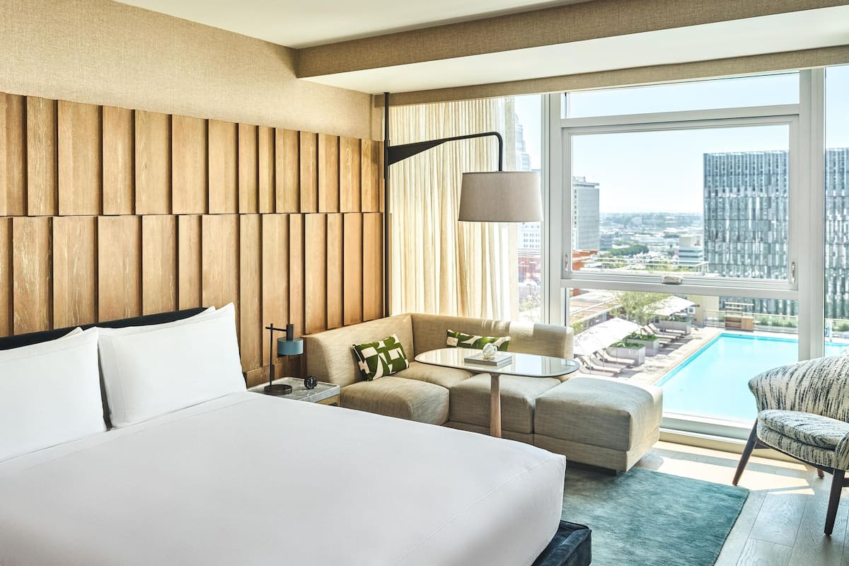 Premium King Accessible Hearing | Living area | 55-inch LCD TV with satellite channels, TV, Netflix