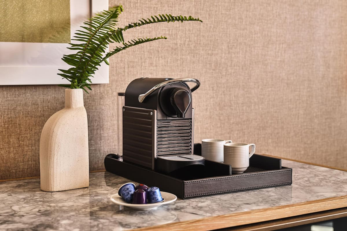 Premium bedding, down comforters, minibar, in-room safe