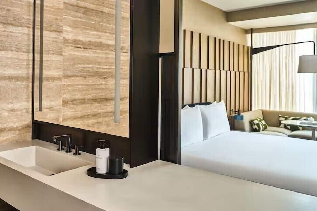 Premium bedding, down comforters, minibar, in-room safe