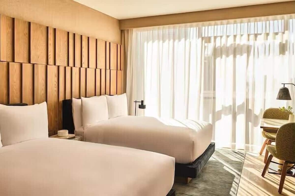 Premium bedding, down comforters, minibar, in-room safe