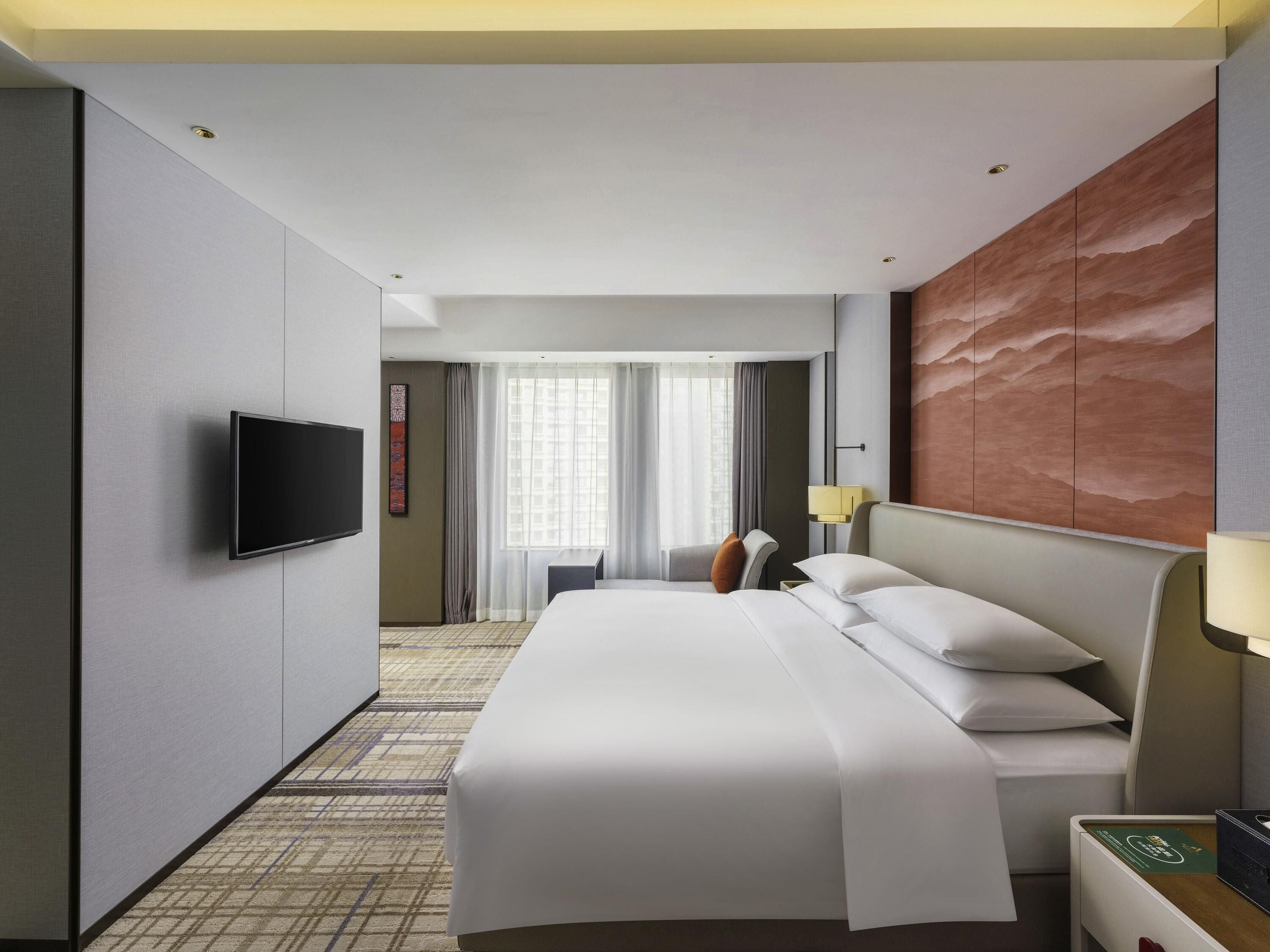 Down comforters, minibar, soundproofing, iron/ironing board