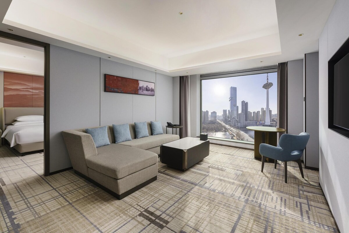 Swiss, Suite, 1 King Bed, City View | Down comforters, minibar, soundproofing, iron/ironing board