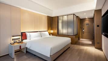 Premier Room, 1 King Bed | 1 bedroom, minibar, soundproofing, iron/ironing board