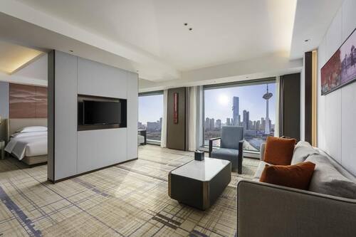 Swiss, Signature Room, 1 King Bed, City View | Down comforters, minibar, soundproofing, iron/ironing board