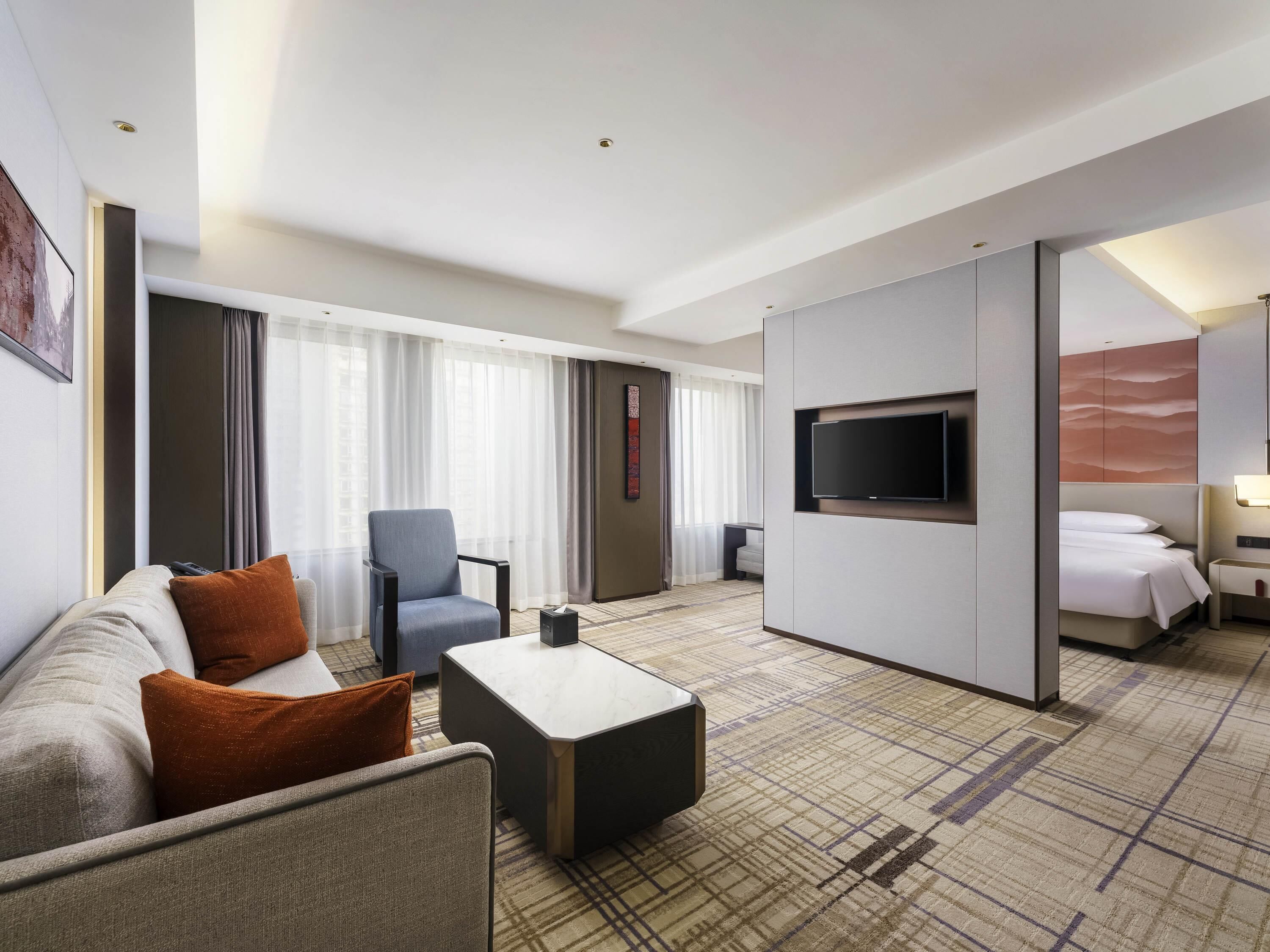 Swiss Select Room, 1 King Size Bed, Oversized Living Space | Down comforters, minibar, soundproofing, iron/ironing board