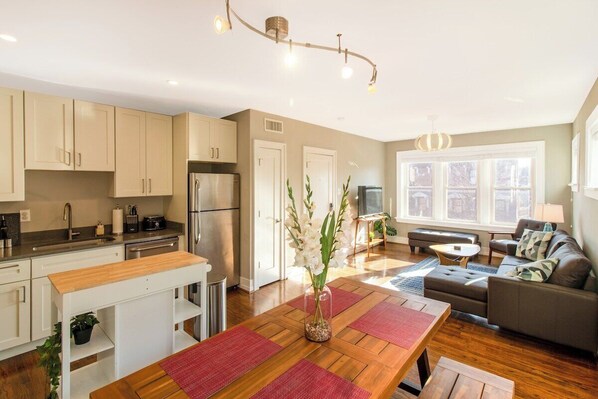 TV, offices - Chic Minimalist Gem w/ Fenced Backyard + W/D (Saint Louis)