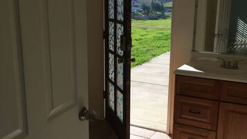 Combined shower/tub, hair dryer, towels, soap