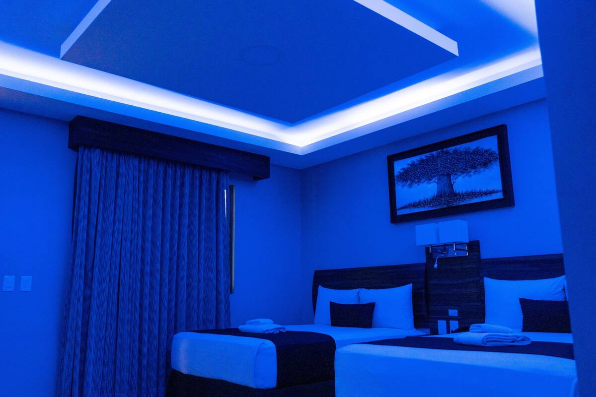 Superior Room, 2 Queen Beds | Desk, laptop workspace, WiFi (free), individually decorated