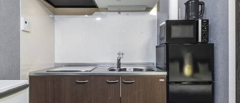 Fridge, microwave, cookware/dishes/utensils